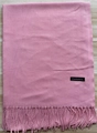 Classic pink cashmere feel scarf with soft tassels on a light wood background - Deep Pink / 68x200cm