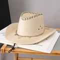 Detail of straw cowboy hat with starfish chain, metallic eyelets and black chin strap - White