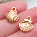 Pair of rose gold shell pendants for DIY jewelry with detailed ocean theme texture - 1Pc Small Shell 12x14mm