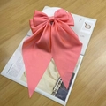 Pink satin oversized ribbon bow hair clip with long streamers on a white background - Watermelon Pink