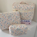 Three sizes of quilted floral corduroy makeup bags with pink and blue flower patterns - Corduroy Flower