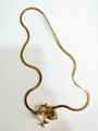 Gold flat snake chain necklace featuring a heart pendant and round pearl charm - Letter X