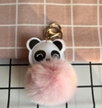 Detail of cute panda plush keychain with a soft pink faux fur pompom and golden metal clasp - Pink