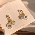 Golden double drop earrings with blue floral pattern and sparkling crystals on silver posts - A564 Gold Double Pendant Earrings
