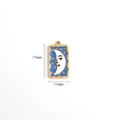 Vintage stainless steel moon face pendant with blue enamel and gold finish details - Blue Moon Smile Face
