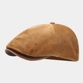 Close-up of mustard corduroy texture and brown faux leather brim on a vintage octagonal cap - One Size / Camel