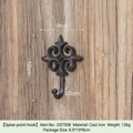 European vintage cast iron spearhead wall hook with lily design on rustic wood background - Spearhead Hook DS7508