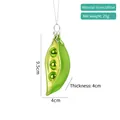 Pea pod shaped green glass Christmas ornament with gold peas and glitter details - Pea Pod Ornament