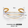 Detailed view of wide 18k gold-plated stainless steel cuff with white enamel finish - Gold White Enamel