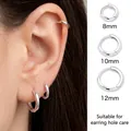 Minimalist S999 sterling silver hoop earrings shown in 8mm, 10mm, and 12mm sizes - A902 Small (S999 Hoop)