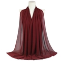 Solid deep red pearl chiffon long scarf wrap displayed on mannequin with soft drape - Burgundy