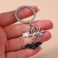 Detail of metal keychain with pumpkin, spider, and black enamel bat charms - Pumpkin/Spider/Bat