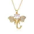 Detail of gold elephant pendant with large clear zircon and micro-set crystals - Elephant