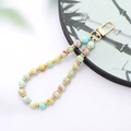 Macro view of colorful agate stone beads and gold lobster clasp for phones or cameras - K3412 Shoushan Stone Natural Stone Pendant