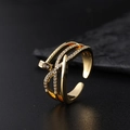 Adjustable golden nail ring with sparkling pave cubic zirconia and bypass wrap design - Gold Cross Pavé Nail Ring