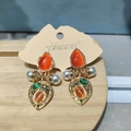 Detail showing vintage gold earrings with orange pear-shaped stones and faux pearls - 925 Sterling Silver Earring Post Orange Pearl Cat's Eye Teardrop Studs