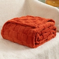 Thick checkered fleece blanket in vibrant orange featuring a soft waffle texture - Maple Brown