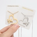 Handheld gold and silver heart necklaces with scissor and comb cutout pendants - Scissors Heart