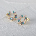 Macro shot of 925 silver stud earrings with colorful zircon stones in a gold finish - EQE49-G-Gold Multi-Color Gem