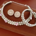 Detailed view of silver jewelry set with pink heart crystals on brown velvet display - Silver-Pink Heart (3-Piece Set)