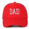 Close-up of red cotton baseball cap featuring white DAD embroidery with high detail - Adjustable / DAD Embroidery / Red