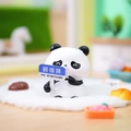 Resin Capybara figurine panda version holding a blue GUDYBAI sign for car dashboard decoration - Goodbye Panda (1188-35)