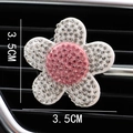 Pink and white rhinestone flower car air vent clip diffuser measuring 3.5CM by 3.5CM - White Flower