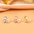 Detailed macro view of cross-style shell flower earrings in silver, gold, and rose gold - Flower Pearl (5#)