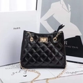 Chic black quilted crossbody bag with a shiny finish and golden metal chain strap - Black