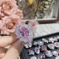 Luxury 18K gold plated ring featuring a large pink oval stone and floral petal halo - Style 0546-Ornate Multi Circle Pink Gemstone