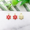 Red enamel and gold floral charms with hanging loops for DIY jewelry on marble surface - 8x11mm / Red