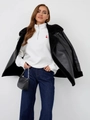 Women's black faux fur leather jacket with white half-zip sweatshirt and blue jeans - S / Thin Style / White