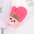 Detail of pink knitted baby mitten featuring a cute brown-eared bear cartoon design - Rose Red