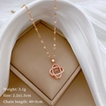 Rose gold interlocking double ring pendant necklace with size 2.2x1.5cm on silk fabric - Rose Gold Stainless Steel Chain Copper Micro-pave Pendant / Rose Gold