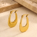 Close-up of golden U-shaped stainless steel earrings on a beige stone background - Smooth Teardrop U-Shaped Style (Style 4)