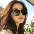 Classic black oversized polarized sunglasses with camellia retro frame design for women - GM Style Two Points Black