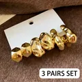 Set of 3 pairs of gold irregular lava and geometric stud earrings on white card - 61# Steel Needle - Gold (6-Piece Set)