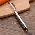 Dual-head stainless steel peeler and grater in silver finish with size markings - 410 Stainless Steel / Bow Shaped Peeler