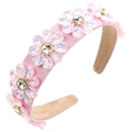 Close-up of pink satin headband with five sparkling iridescent crystal flowers - Pink