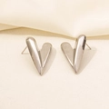 Close-up of heart shaped 304 stainless steel earrings with high mirror polish finish - Streamlined V Heart / Silver