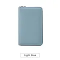 Light blue RFID leather wallet with zip closure and lychee texture for travel - Flax Blue
