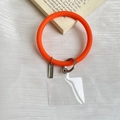 Orange silicone phone wrist strap with silver metal ring and transparent gasket - Orange