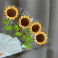 Handmade crochet sunflower bouquet set of four with vibrant yellow petals and green leaves - Large Sunflower Bouquet