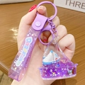 Purple liquid quicksand keychain with a miniature sailboat and star glitter charm - Quicksand Sailboat - Purple