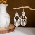 Detail of vintage silver peacock tassel earrings with teal beads on a wooden branch - Silver Green Bead Tassel(E2875-06)