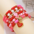 Detail of handmade beaded bracelets with red heart pendant and LOVE letter beads - Red Pink LOVE/BE MINE Heart Set