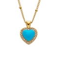 Elegant gold titanium necklace with a light blue heart pendant and shimmering rhinestones - Blue Heart Zirconia