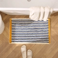 Thick plush rectangular blue and white striped rug on wooden floor with yellow border - 40x60cm / Blue Tone