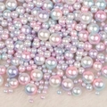 Macro shot of assorted sizes of iridescent faux pearls for DIY handmade jewelry crafts - No Hole / 4/6/8/10mm Mixed, approx 250 Pieces / Pink Light Green