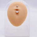 Silver stainless steel belly button ring with sparkling crystal heart pendant on model - Pave Setting Heart Pendant